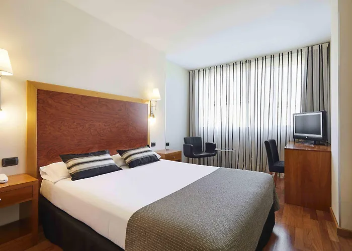 Exe Plaza Delicias Hotell