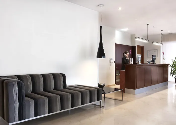 Exe Plaza Delicias Hotell